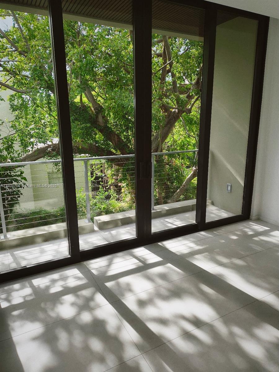 234 Southwest 22nd Road Miami, FL 33129 - Photo 22 of 31 a view of a garden from a room