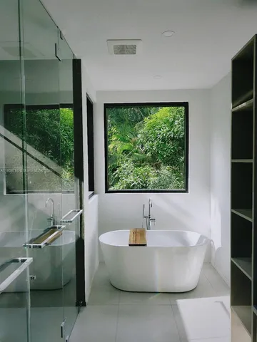 a view of bathroom with a bathtub