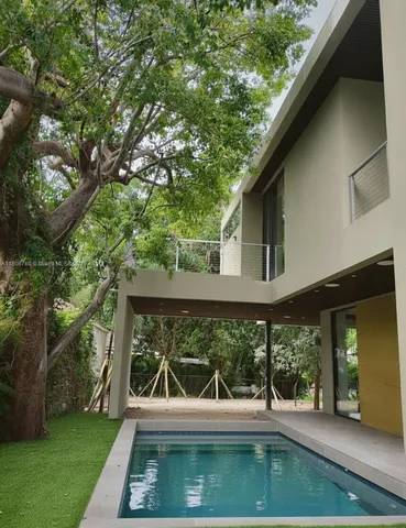 a view of a backyard with garden
