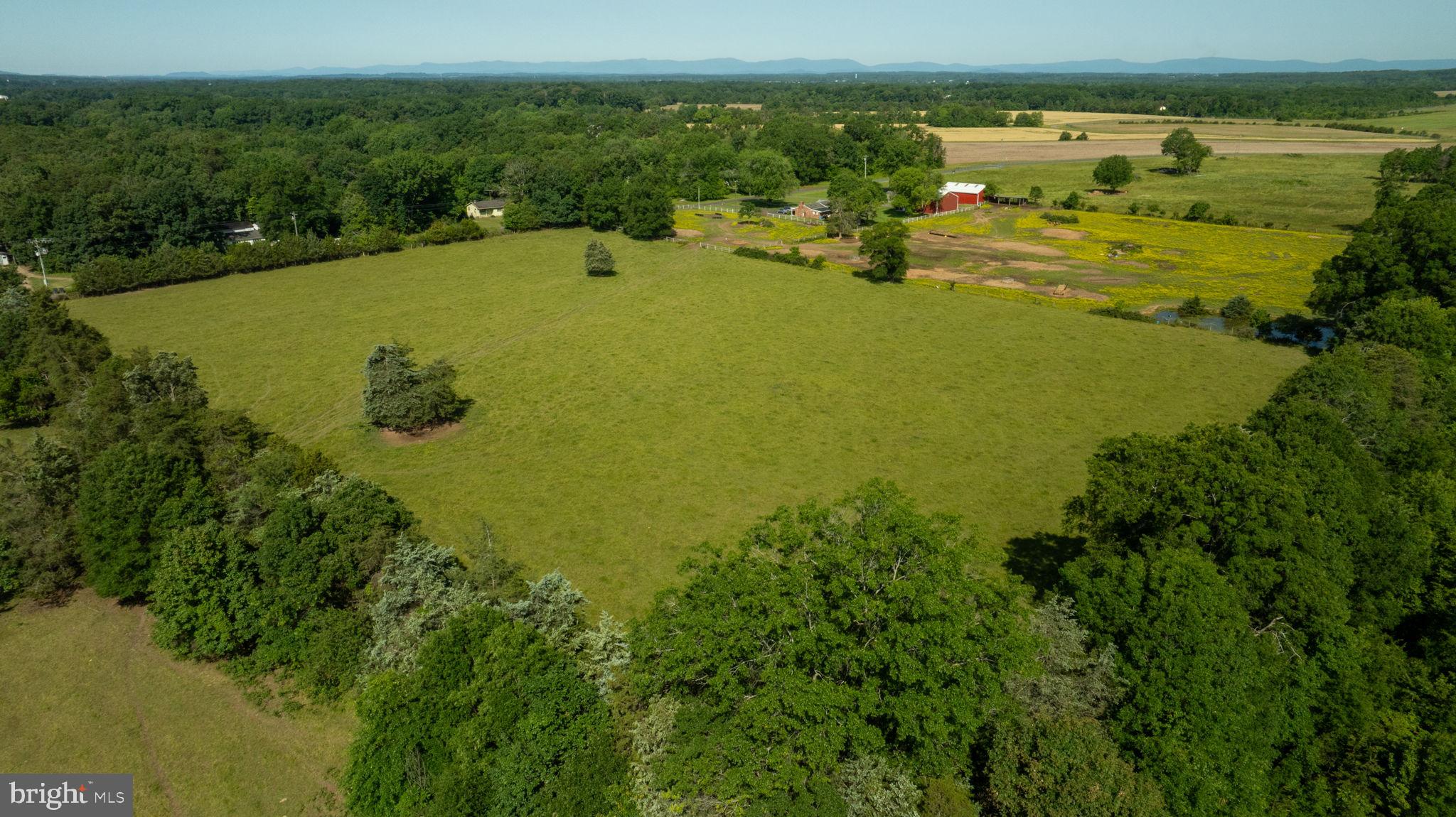 11243 Blackwelltown Road Midland, VA 22728 - Photo 10 of 12 a view of a lake with a houses