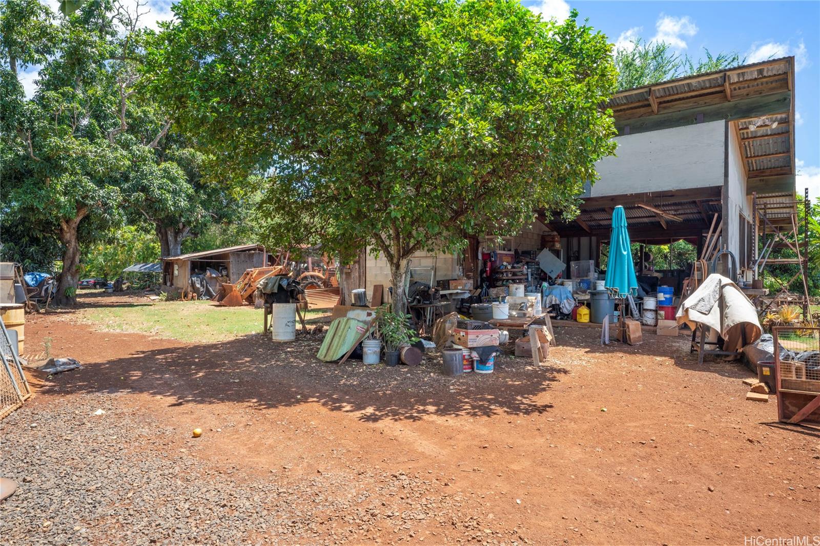 66-195 Kaamooloa Road, Unit B Waialua, HI 96791 - Photo 13 of 15 a view of a street with sitting area