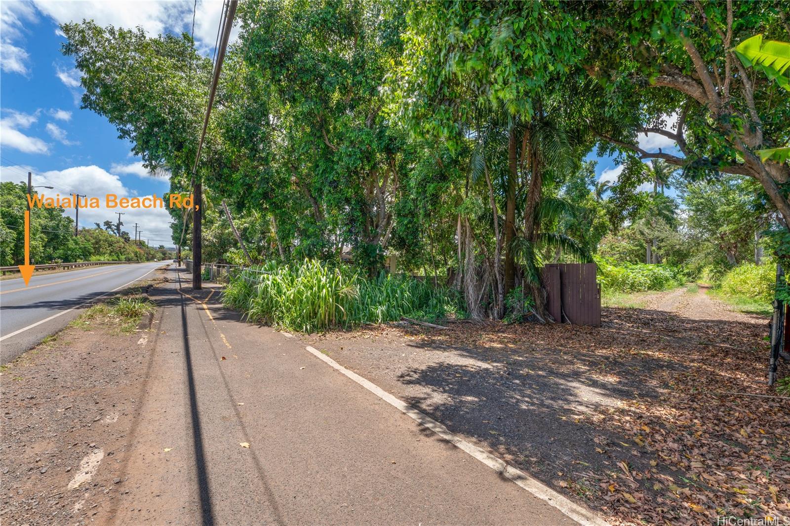 66-195 Kaamooloa Road, Unit B Waialua, HI 96791 - Photo 15 of 15 a view of a street with a trees