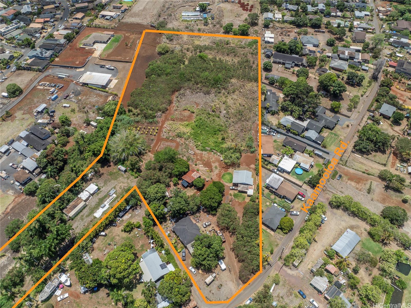 66-195 Kaamooloa Road, Unit B Waialua, HI 96791 - Photo 5 of 15 an aerial view of residential houses with outdoor space