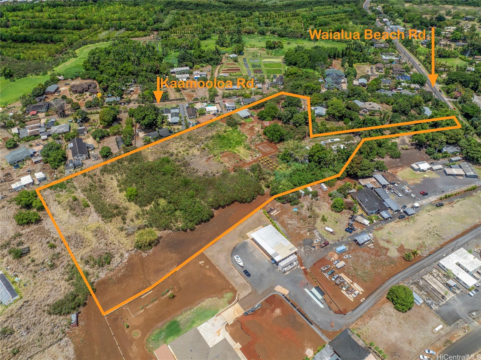 66-195 Kaamooloa Road, Unit B Waialua, HI 96791 - Photo 7 of 15 an aerial view of a residential houses with outdoor space