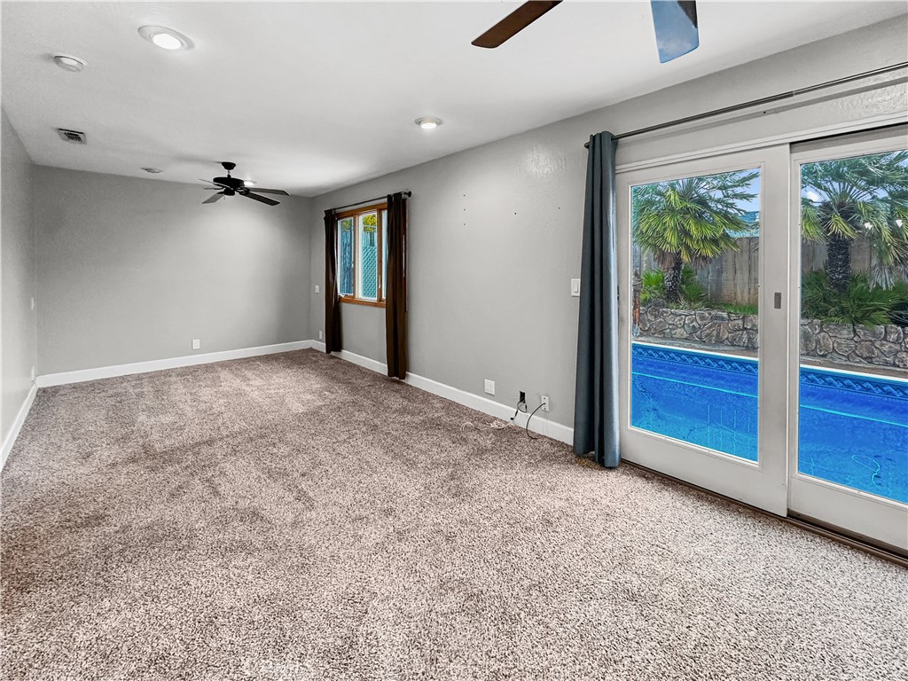 15 Regent Loop Oroville, CA 95966 - Photo 8 of 22 a view of an empty room with a window
