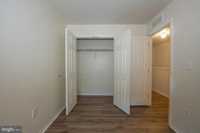 a bathroom with a sink mirror toilet and bathtub