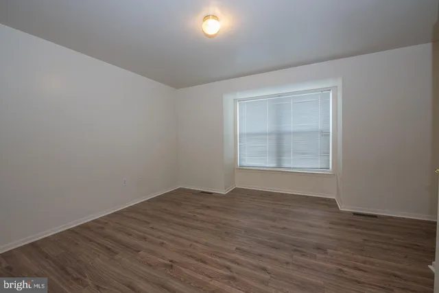 a view of a house with a street