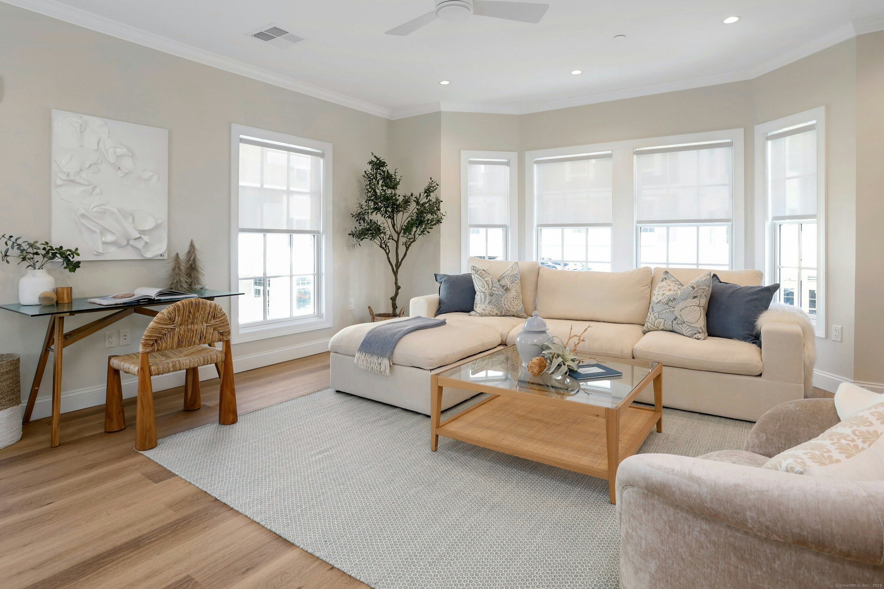 340 Heights Road, Unit 210 Darien, CT 06820 - Photo 1 of 1 a living room with furniture and a large window
