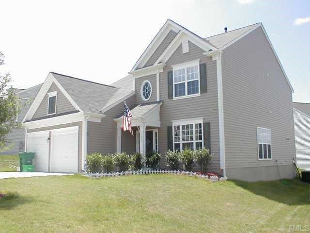 405 Willingham Road Morrisville, NC 27560 - Photo 1 of 1 a front view of a house with a yard