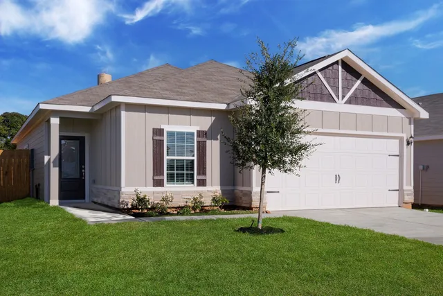a front view of house with yard