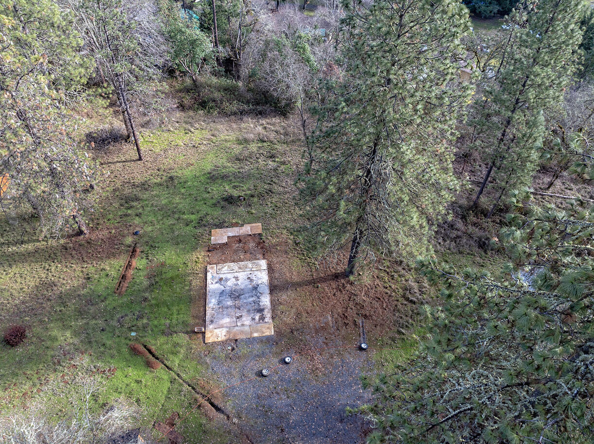1329 West Evans Creek Road Rogue River, OR 97537 - Photo 18 of 23 an aerial view of a house with a yard