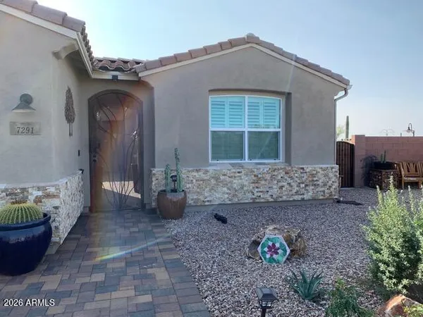 a view of a house with a patio