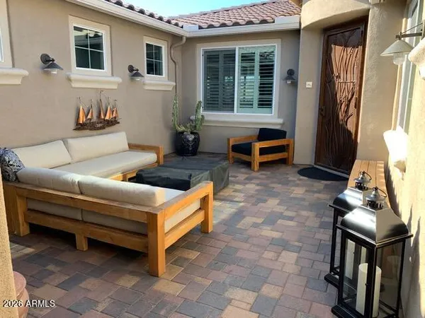 a living room with furniture and a window