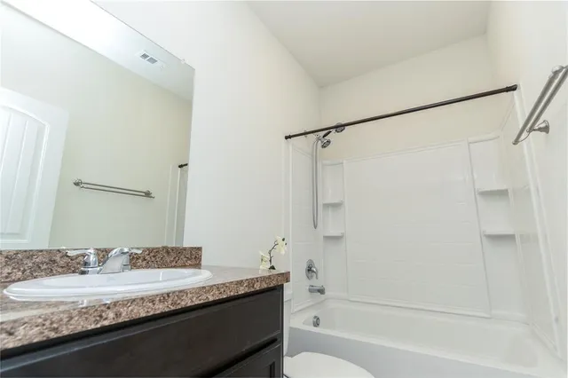 a close up of a bathtub in a bathroom