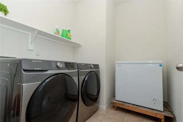 a view of a green yard with a house