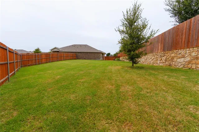 a front view of a house with swimming pool