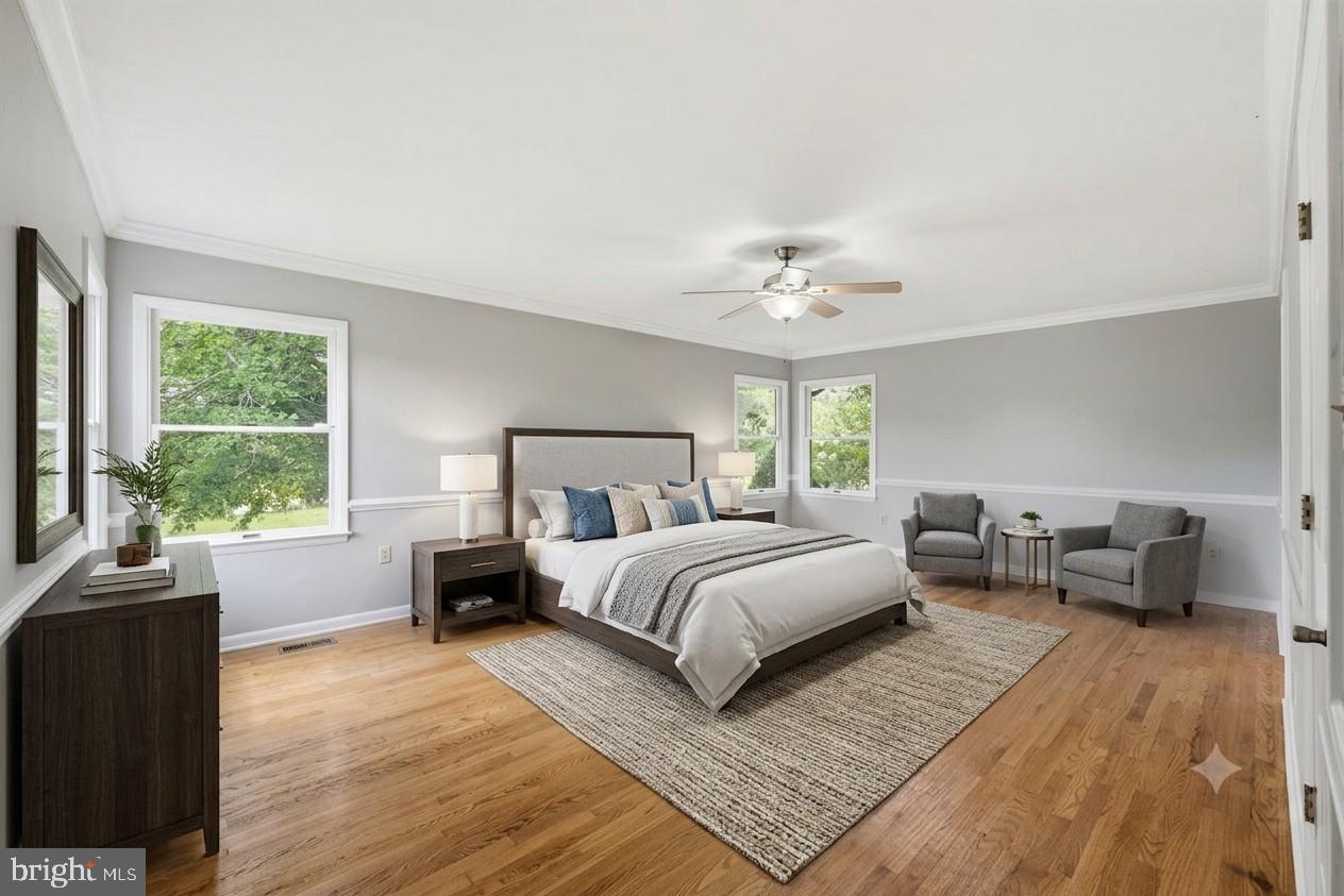 15010 Rolling Ridge Road Haymarket, VA 20169 - Photo 18 of 61 Serene bedroom with natural light.