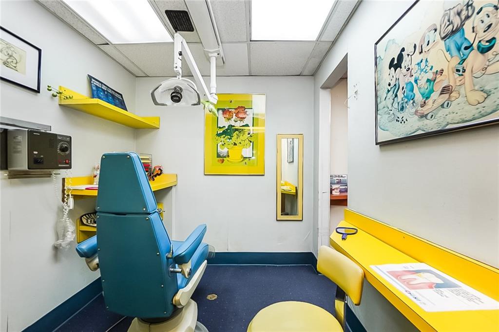 365 Bay Ridge Parkway Brooklyn, NY 11209 - Photo 11 of 33 a bathroom with a sink mirror and vanity