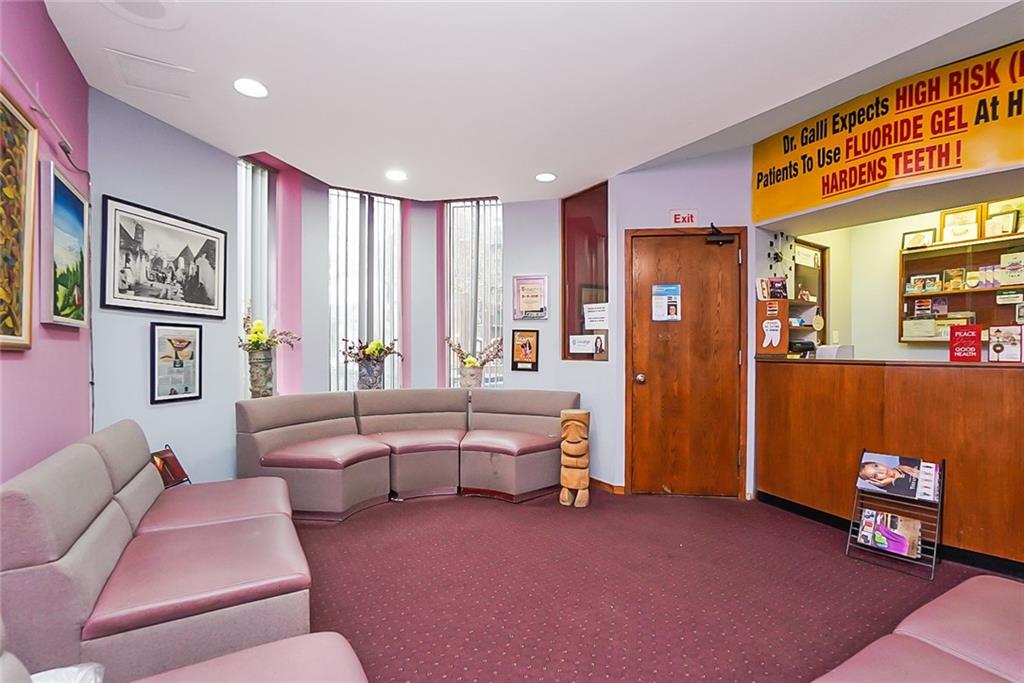 365 Bay Ridge Parkway Brooklyn, NY 11209 - Photo 13 of 33 a living room with furniture and a flat screen tv