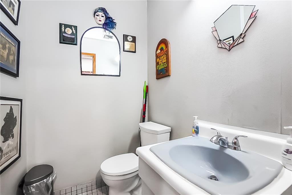 365 Bay Ridge Parkway Brooklyn, NY 11209 - Photo 15 of 33 a bathroom with a sink mirror and toilet