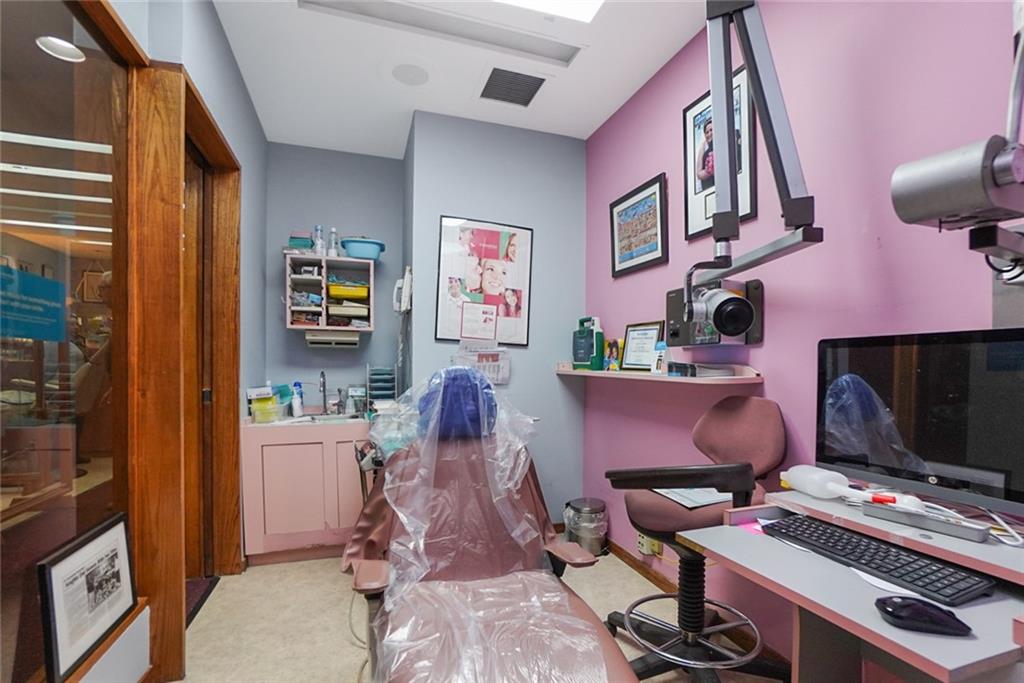 365 Bay Ridge Parkway Brooklyn, NY 11209 - Photo 16 of 33 a view of a workspace with furniture and a window