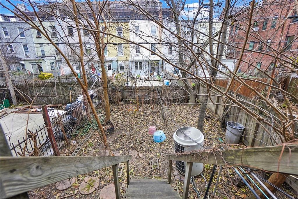 365 Bay Ridge Parkway Brooklyn, NY 11209 - Photo 21 of 33 a backyard of a house with table and chairs