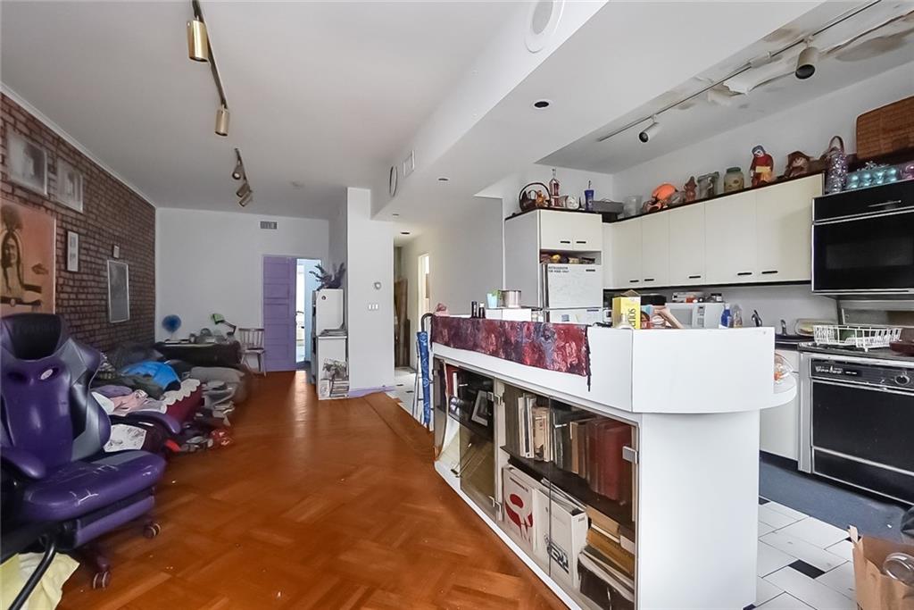 365 Bay Ridge Parkway Brooklyn, NY 11209 - Photo 25 of 33 a living room with furniture and a flat screen tv