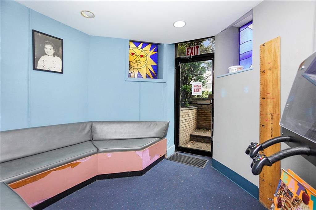 365 Bay Ridge Parkway Brooklyn, NY 11209 - Photo 3 of 33 a living room with furniture pool table and painting on the wall