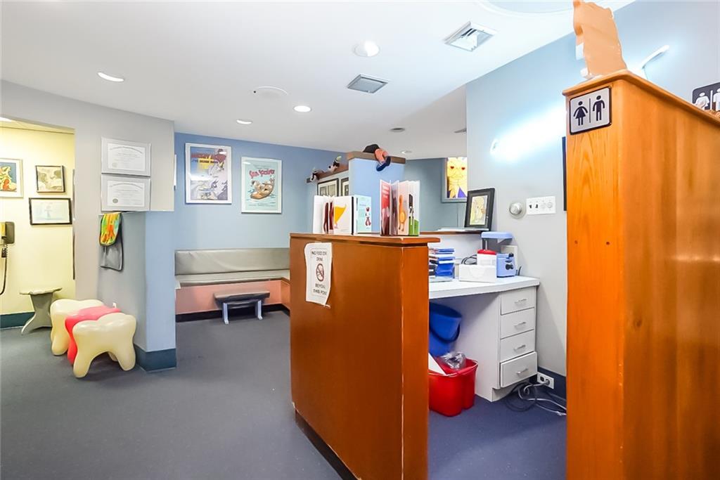 365 Bay Ridge Parkway Brooklyn, NY 11209 - Photo 6 of 33 a room with table chair and a couch