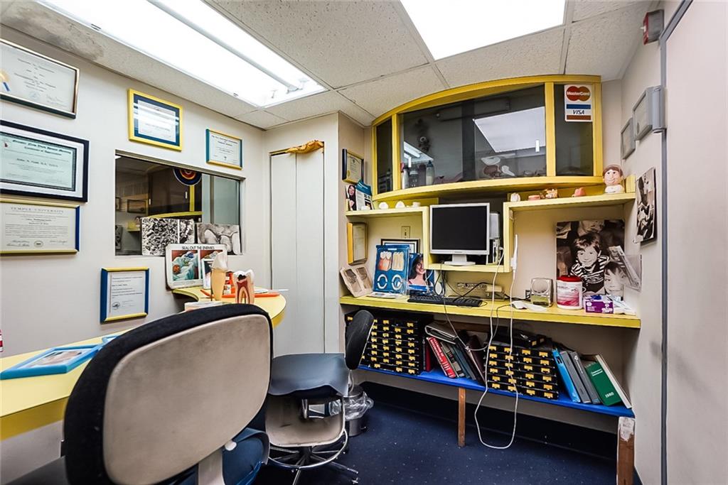 365 Bay Ridge Parkway Brooklyn, NY 11209 - Photo 9 of 33 a room with furniture and a flat screen tv