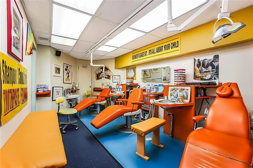 365 Bay Ridge Parkway Brooklyn, NY 11209 - Photo 10 of 33 a group of people sitting in front of a building