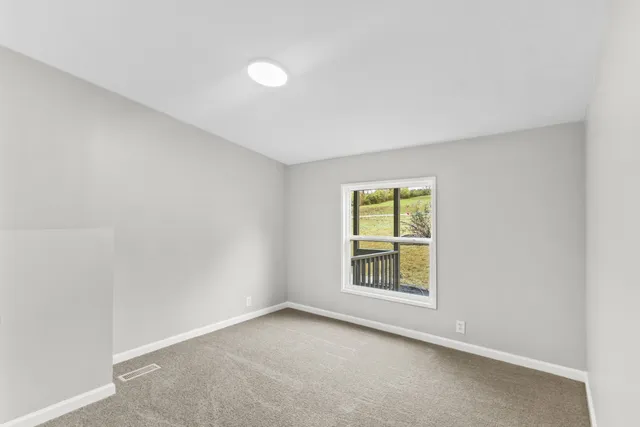 an empty room with a window