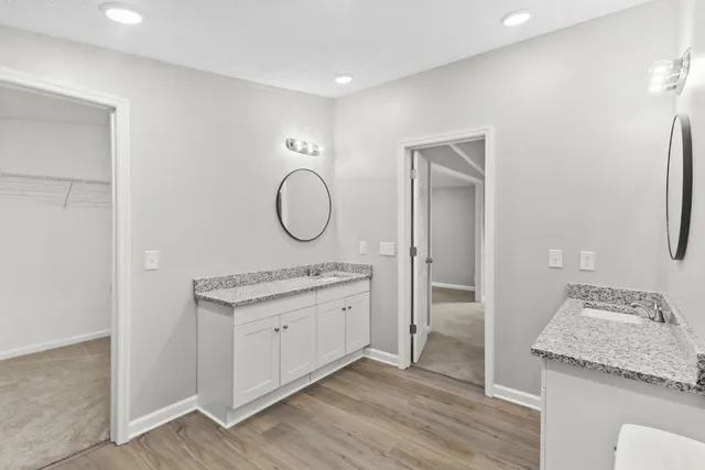 a view of a house with a wooden deck