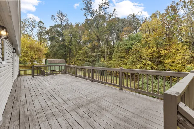 a house view with swimming pool