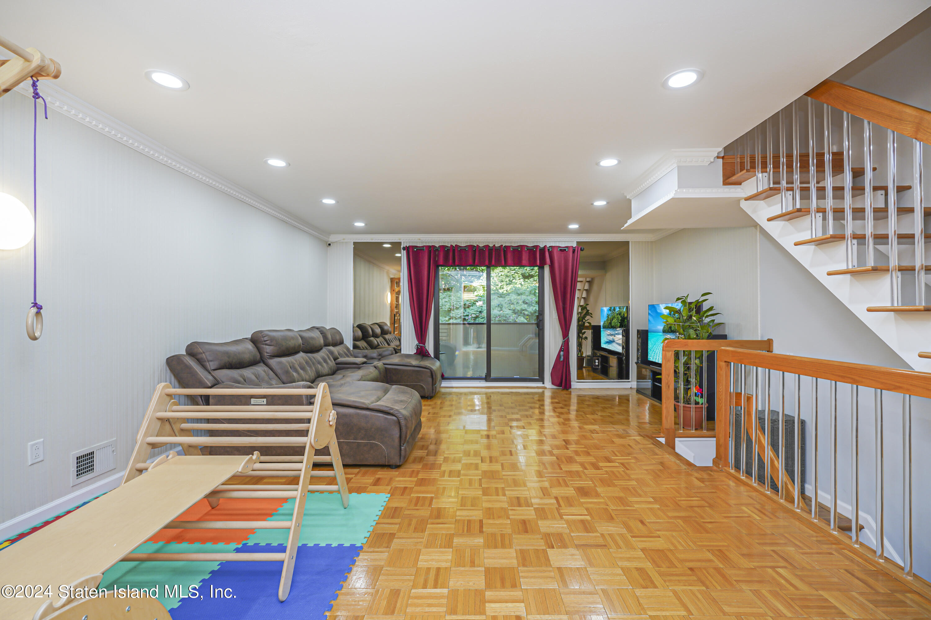 53 Alan Loop Staten Island, NY 10304 - Photo 11 of 37 (11) LIVING ROOM-BALCONY ACCESS