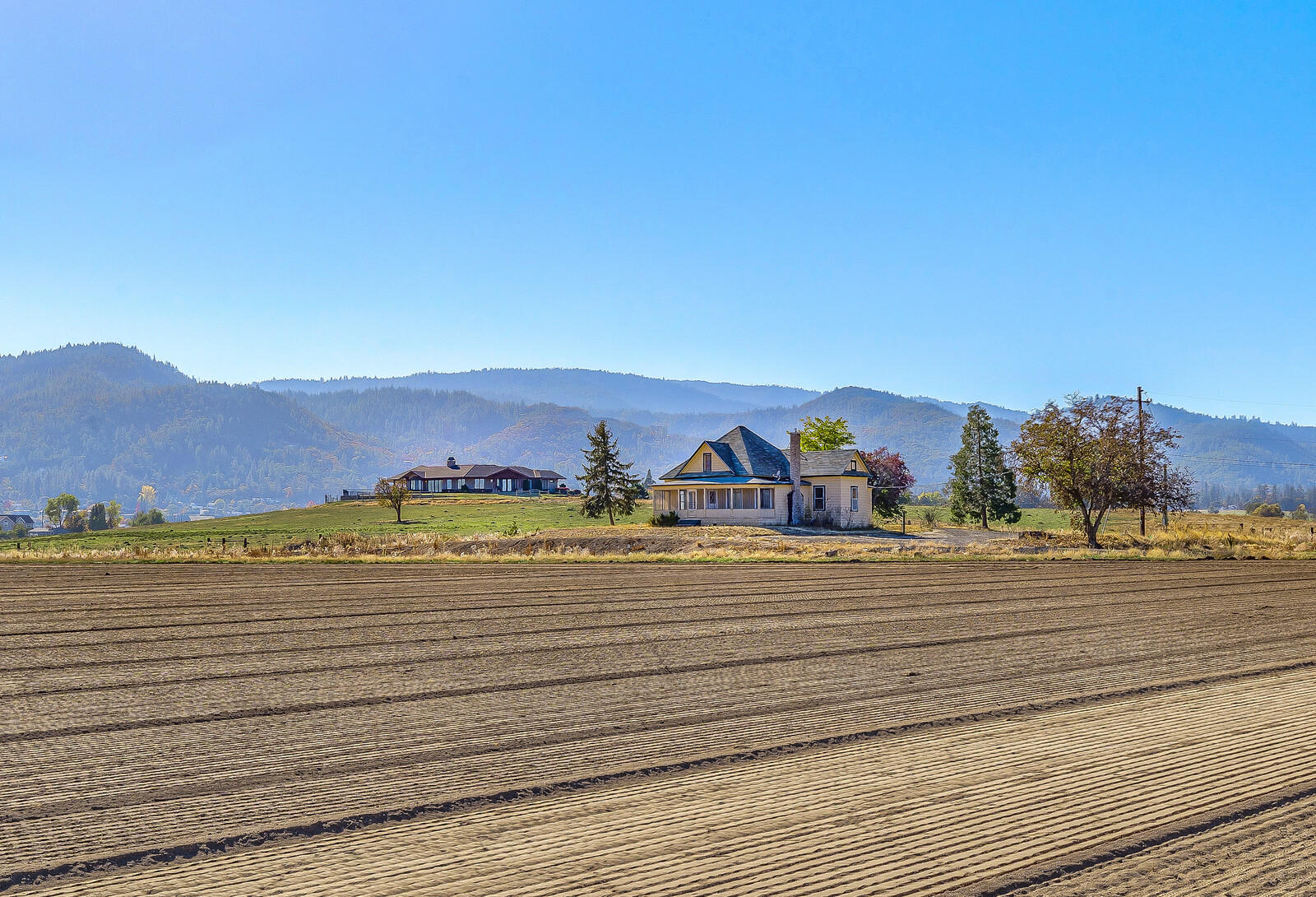 5405-5413 Seven Oaks Road Central Point, OR 97502 - Photo 52 of 65 a view of a lake view and mountain view