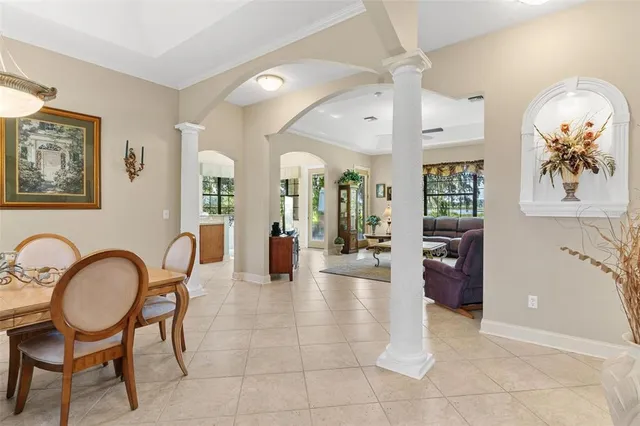 a lobby with furniture and wooden floor