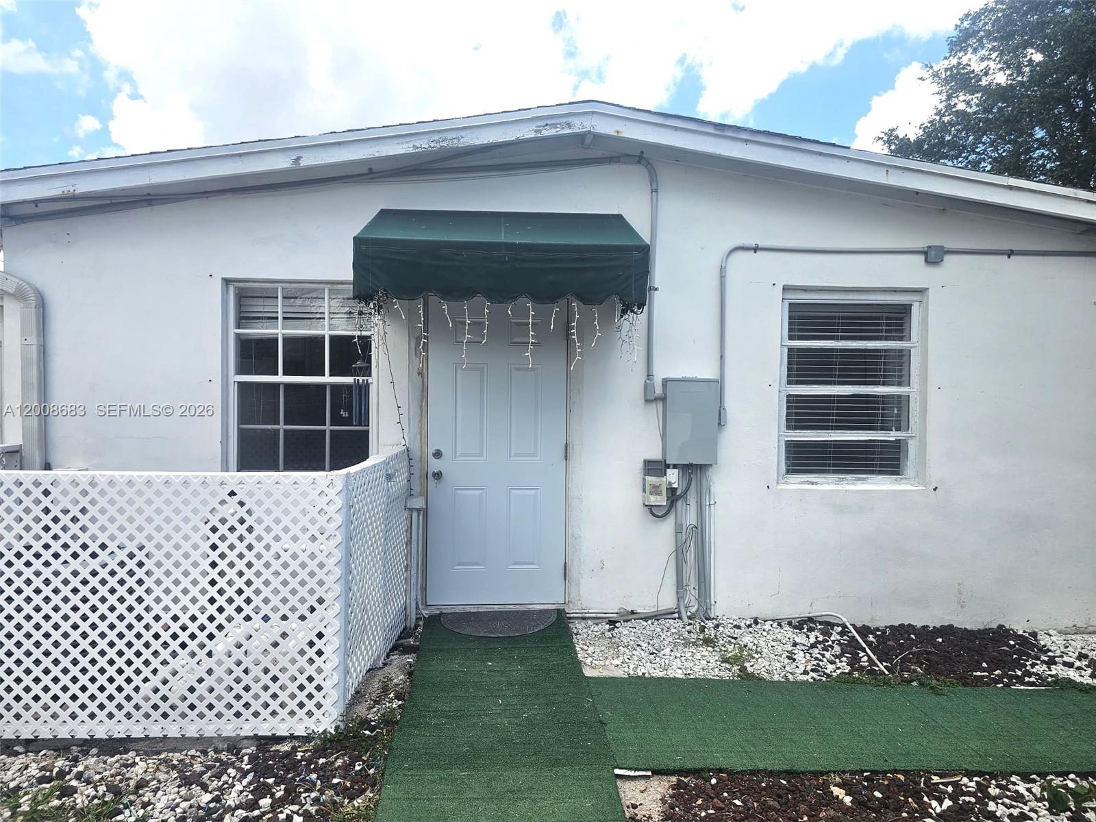 10790 Southwest 46th Street, Unit 10790 Miami, FL 33165 - Photo 7 of 19 a front view of a house