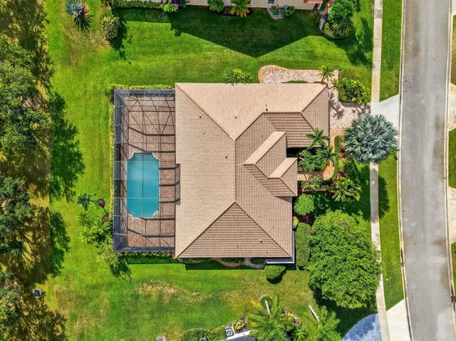 a kitchen with white cabinets a sink and dishwasher