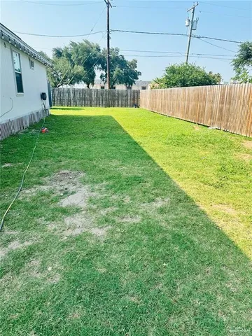 a view of a backyard with a garden