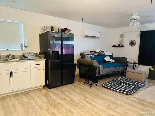 a kitchen with a stove and cabinets