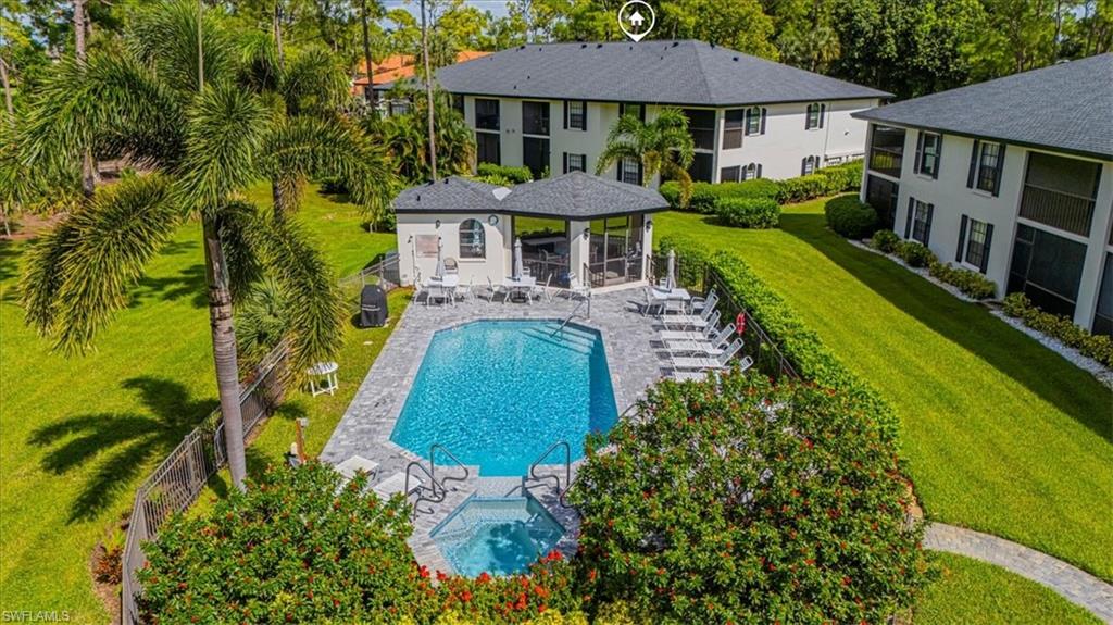 809 Augusta Boulevard, Unit 3 Naples, FL 34113 - Photo 5 of 32 Community pool featuring a patio area and a gazebo