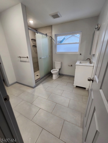 296 Chadwick Avenue Newark, NJ 07112 - Photo 10 of 12 a view of a storage & utility room with two washing machine