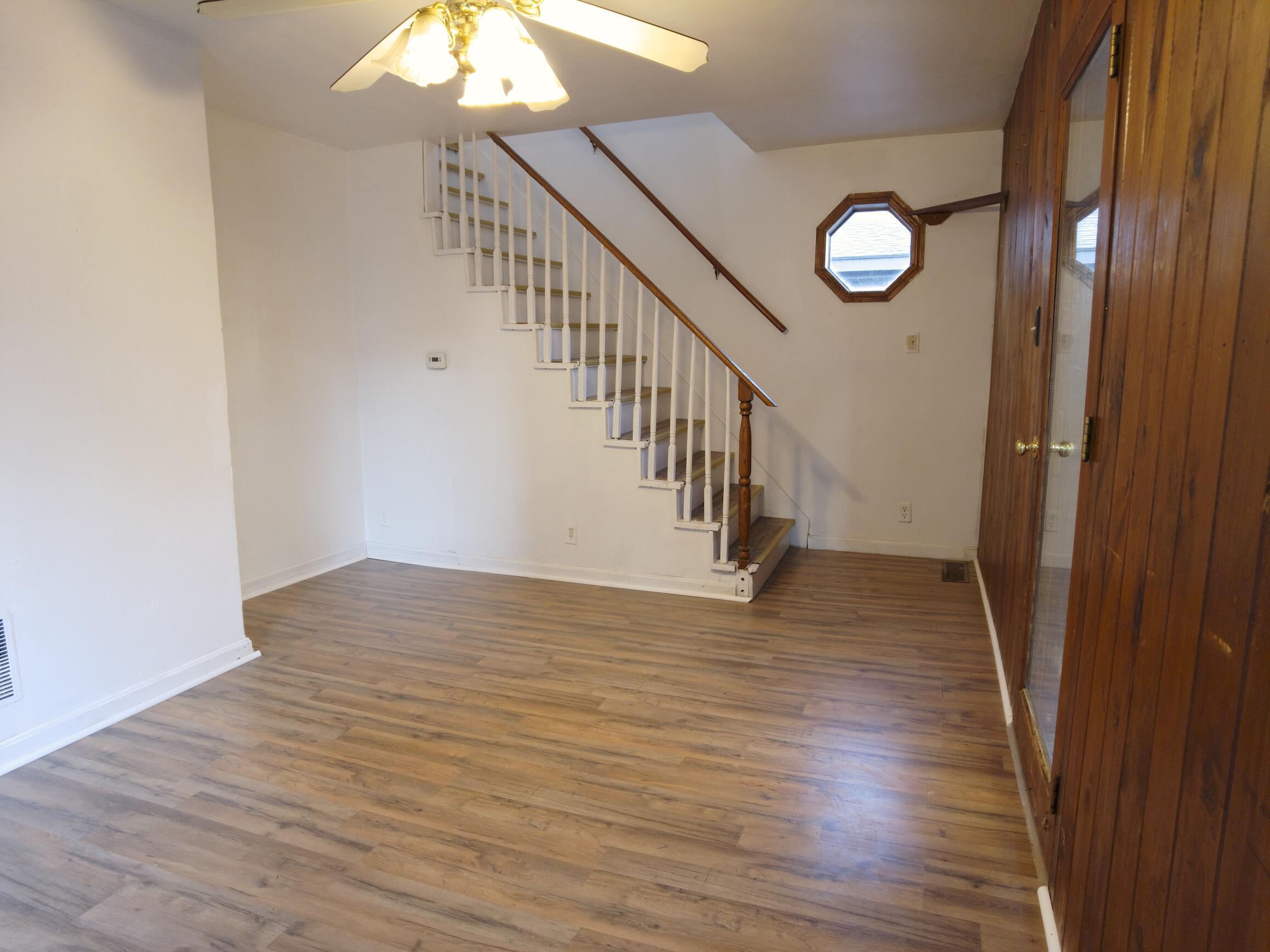 9 Spruce Court Sanford, ME 04073 - Photo 11 of 31 Living Room with Stairs 2