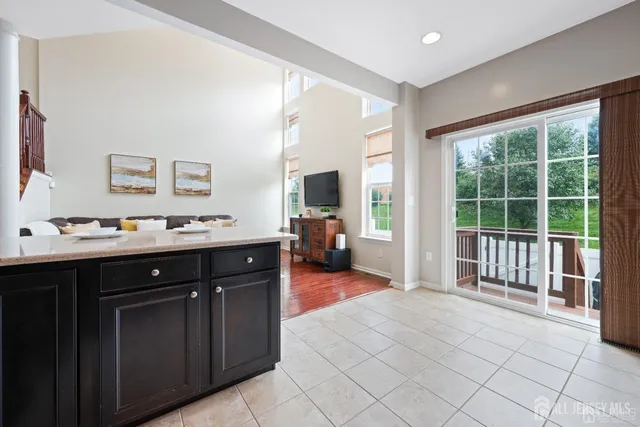 a spacious bathroom with a double vanity sink and a large mirror