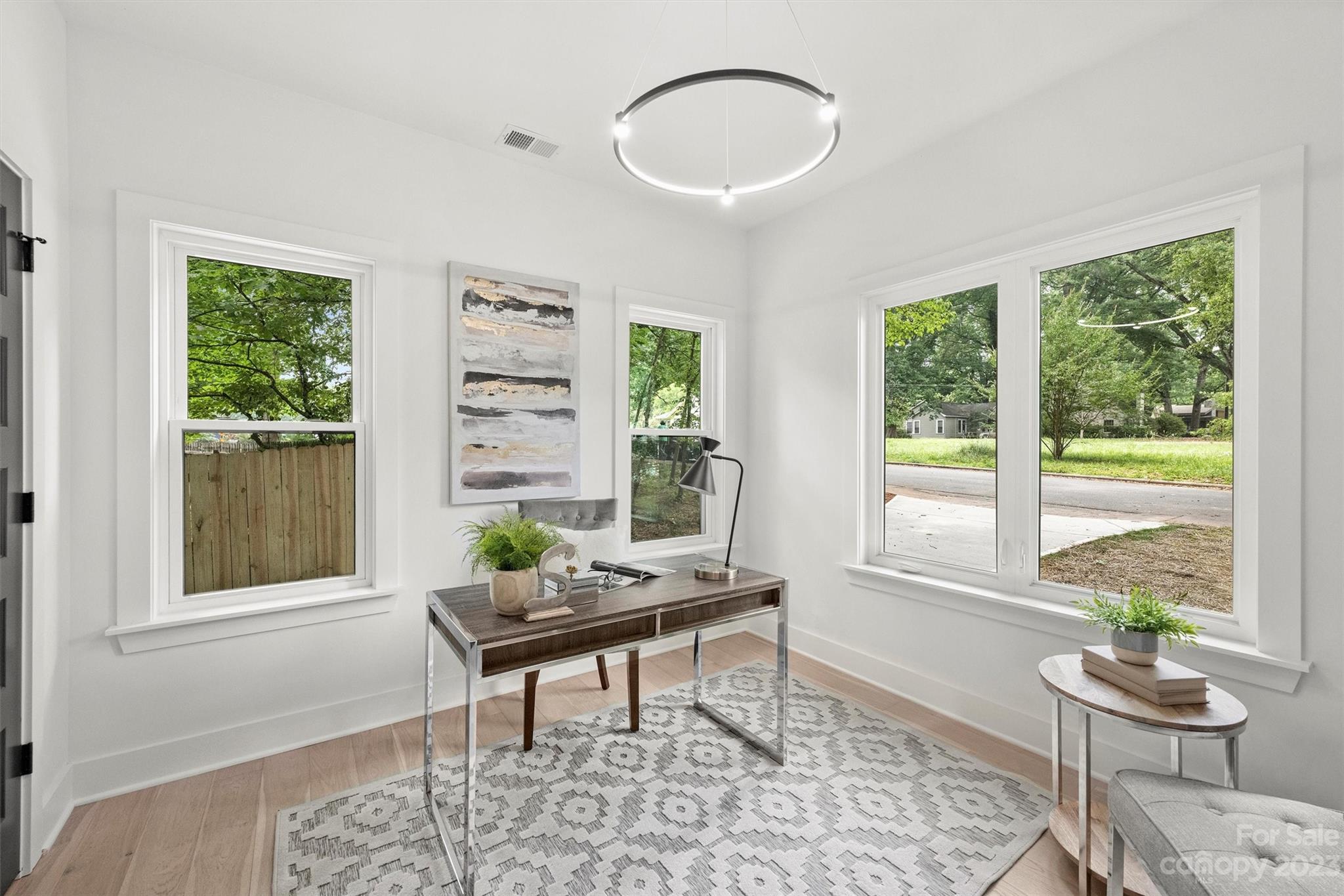1608 Chippendale Road Charlotte, NC 28205 - Photo 16 of 34 a living room with furniture and a window