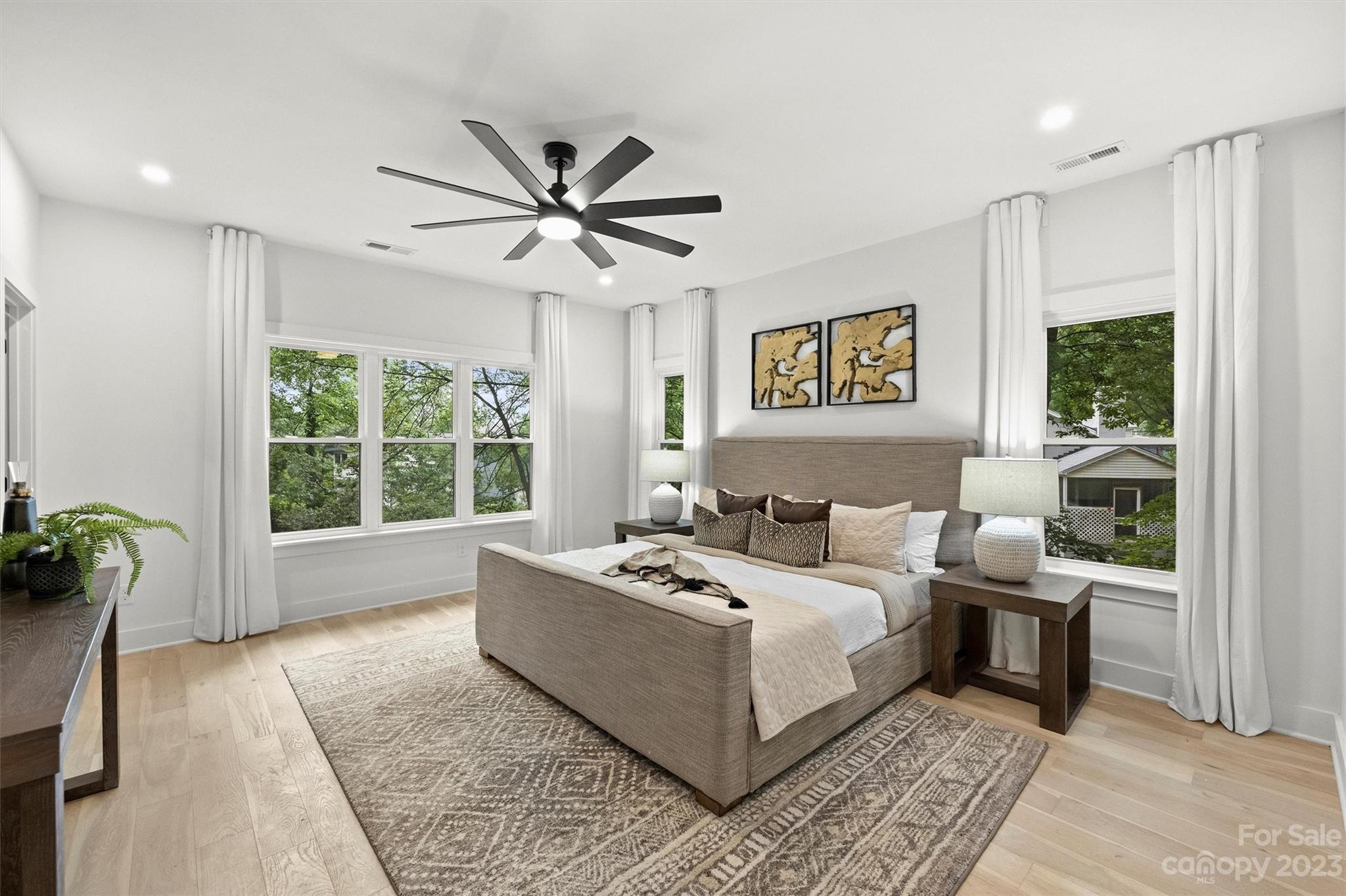 1608 Chippendale Road Charlotte, NC 28205 - Photo 20 of 34 a living room with a bed furniture and a window