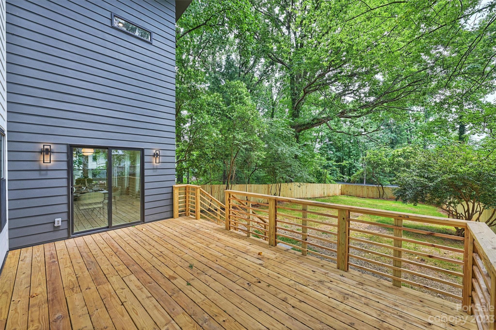 1608 Chippendale Road Charlotte, NC 28205 - Photo 33 of 34 a view of balcony and deck with wooden floor and fence