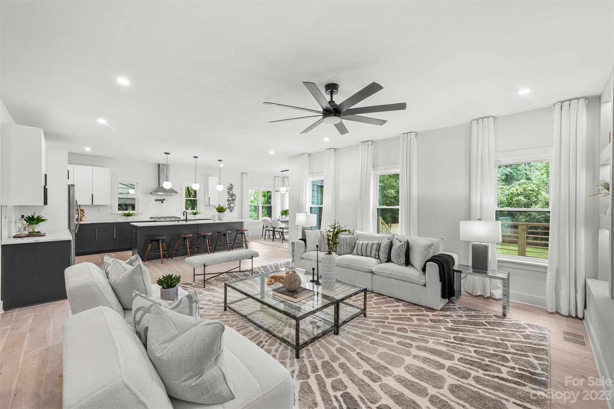 1608 Chippendale Road Charlotte, NC 28205 - Photo 9 of 34 a living room with furniture and a large window