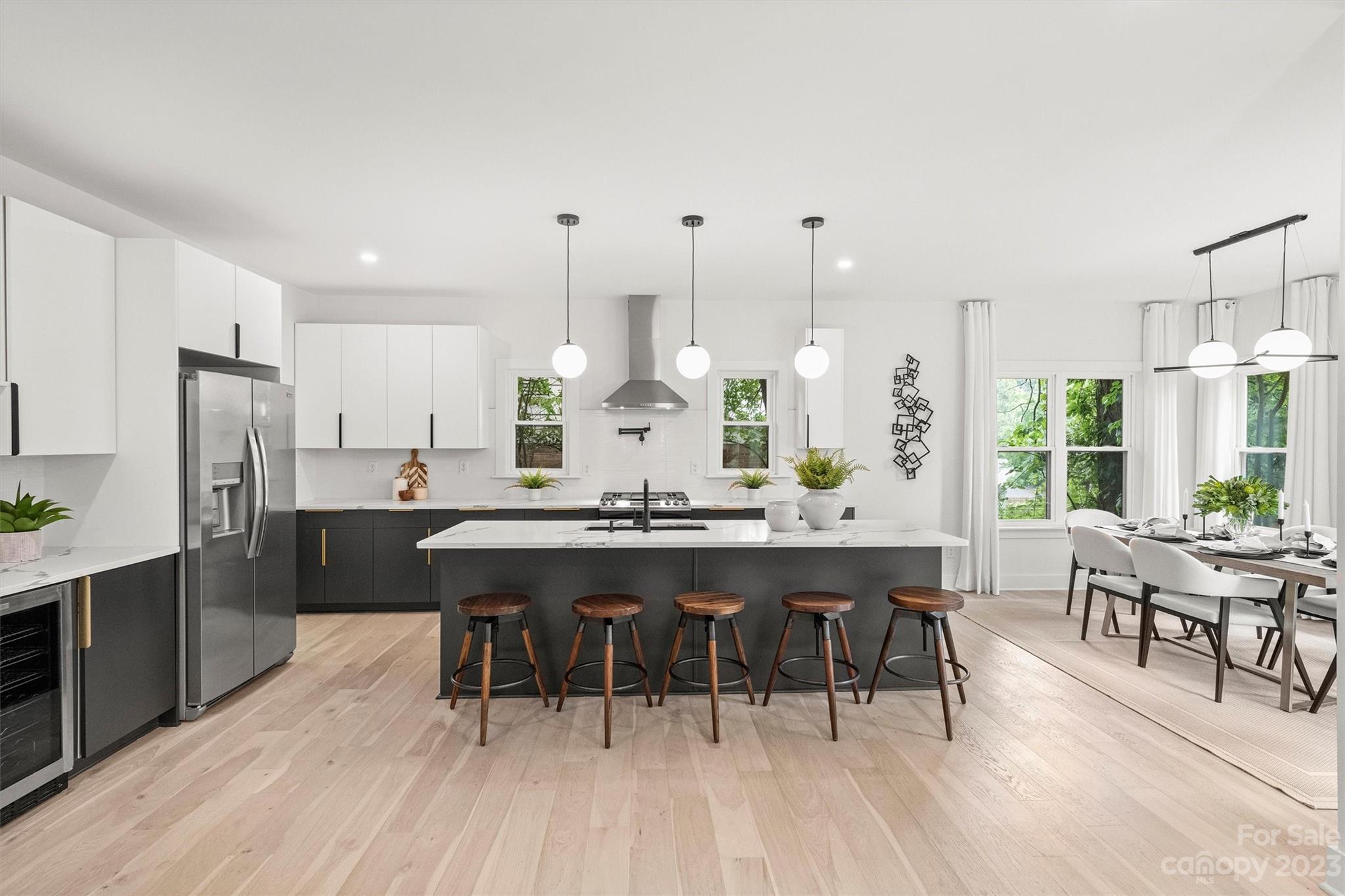 1608 Chippendale Road Charlotte, NC 28205 - Photo 10 of 34 a large kitchen with a table and chairs